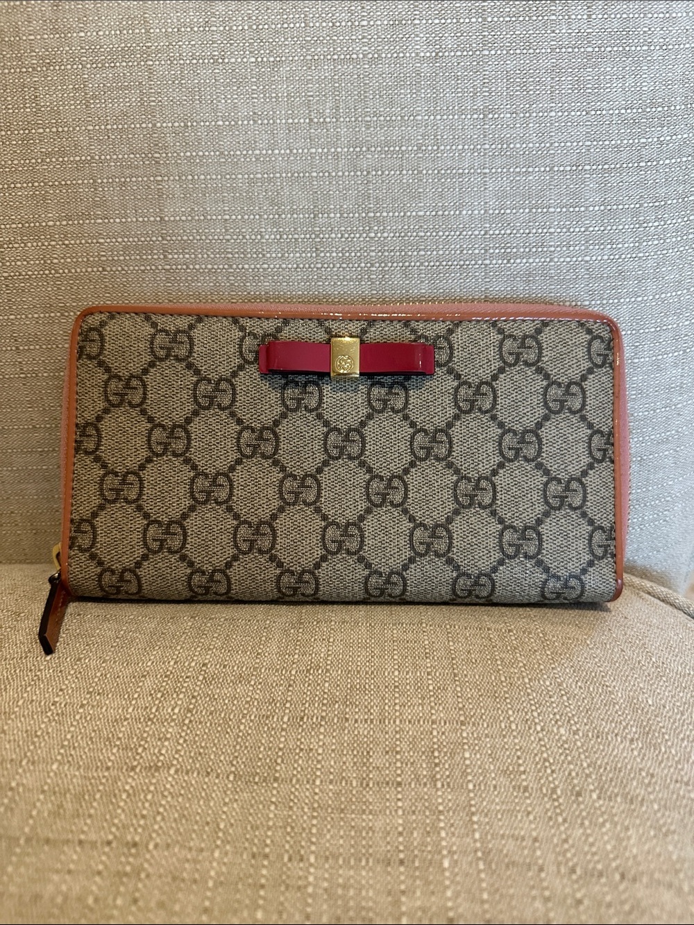Gucci Beige GG Supreme Wallet with Red Bow and Tan Trim